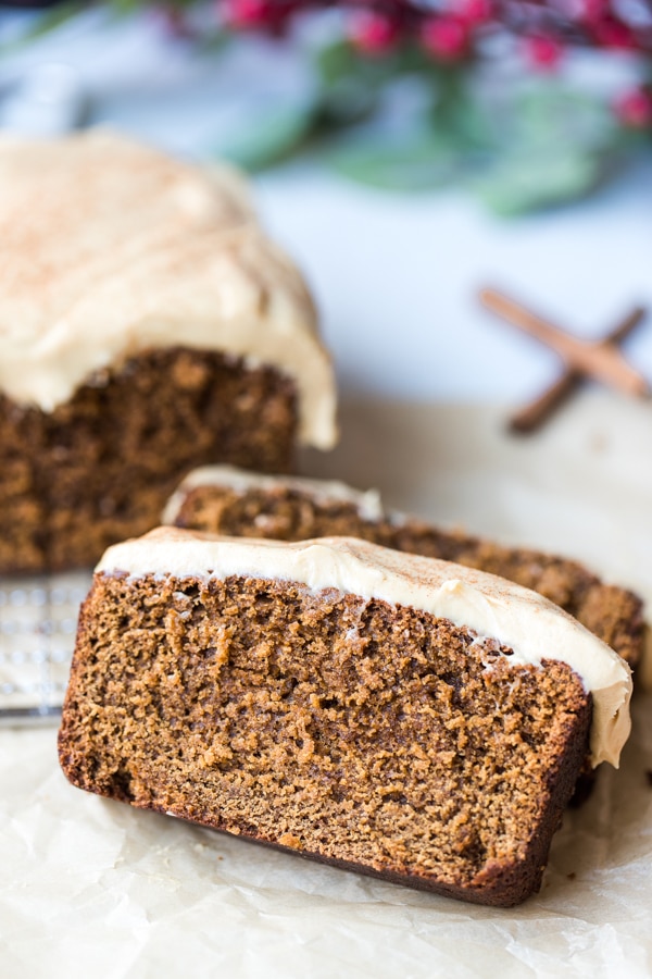 a slice of gingerbread with cream cheese frosting on top