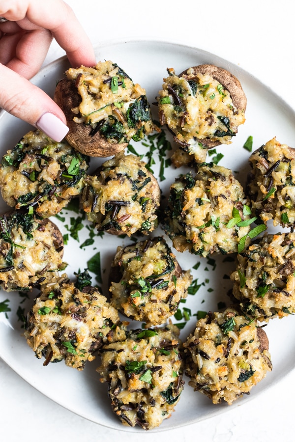 stuffed mushrooms on a white plate