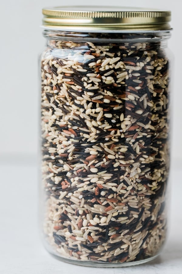 a glass mason jar filled with wild rice blend