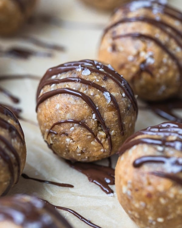 energy balls drizzled with chocolate and flaky sea salt