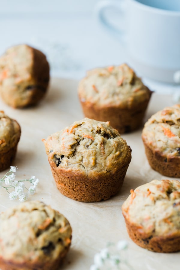 banana carrot muffins on parchment paper 