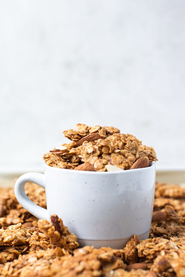 granola in a white mug