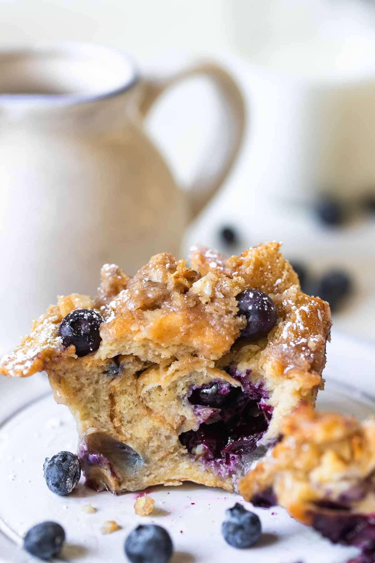 blueberry muffin on a white plate