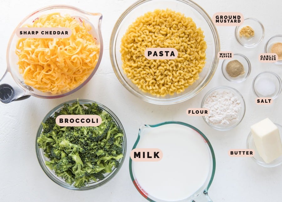 ingredients needed to make mac and cheese in small glass bowls 