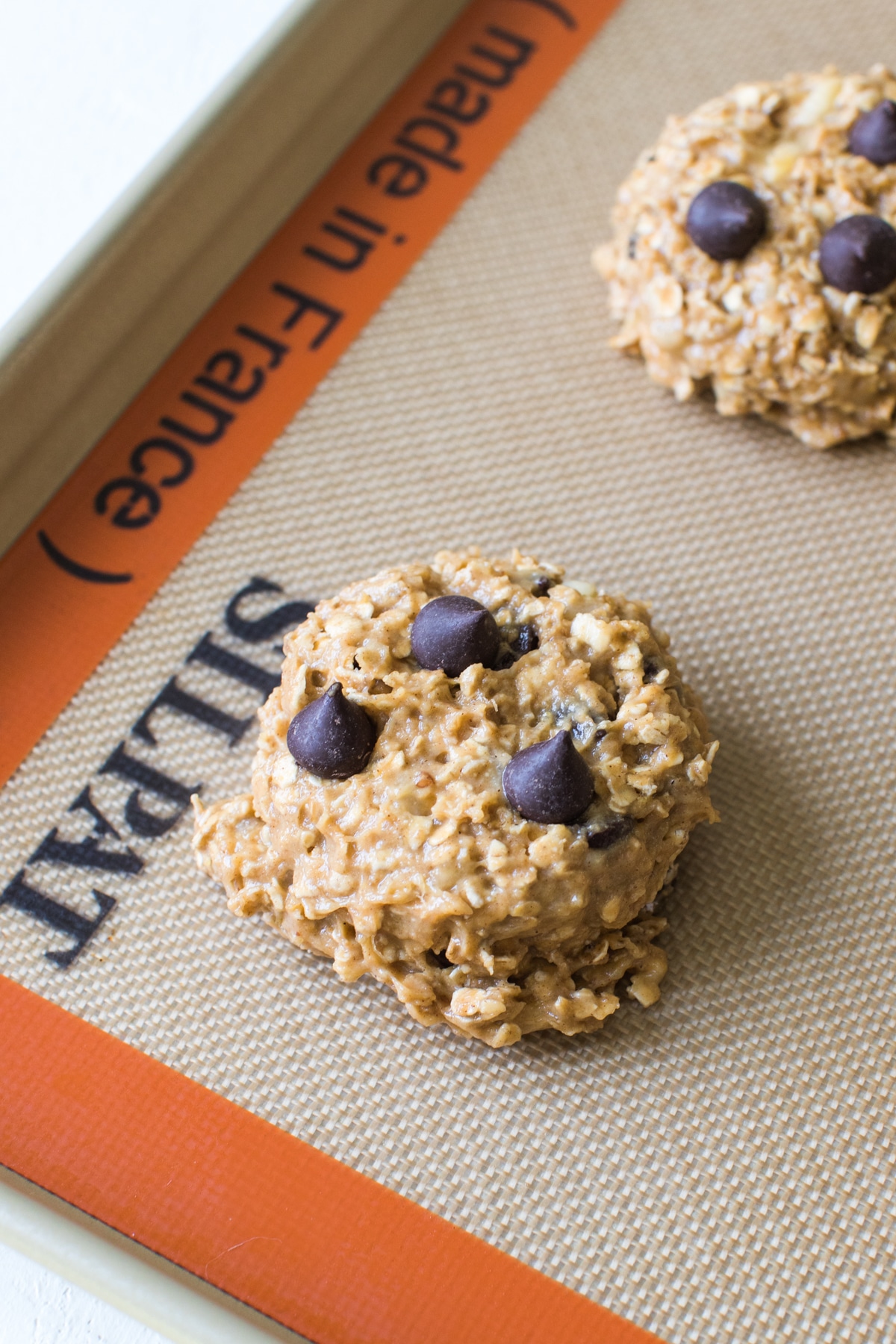 a breakfast cookie on a silicone baking mat