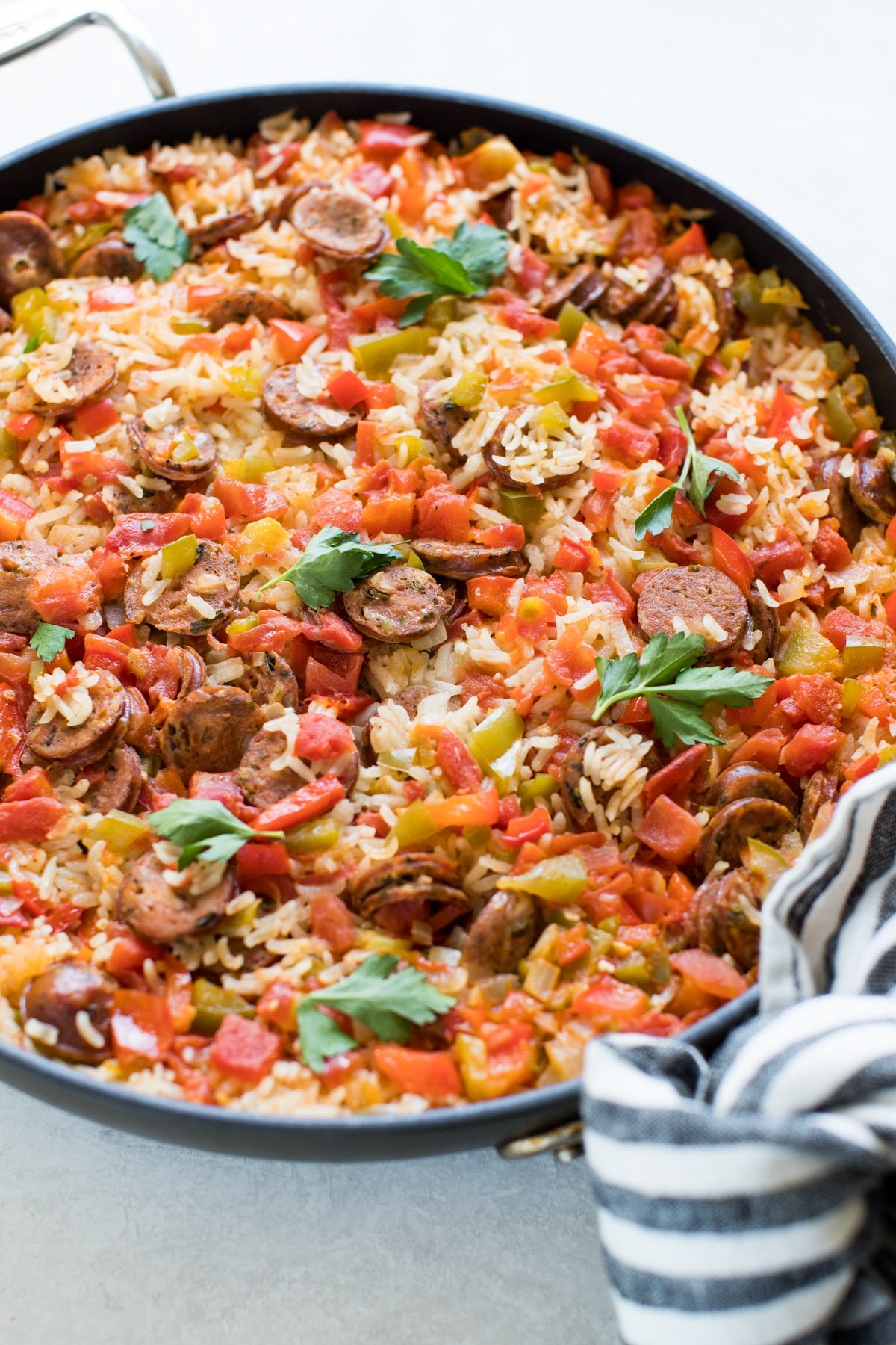 skillet with sausage, rice and peppers