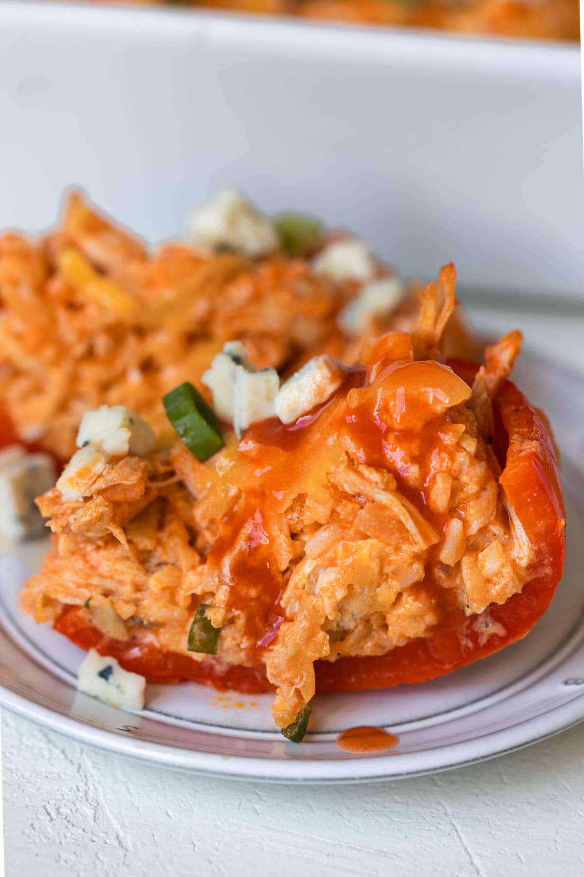 stuffed bell pepper on a white plate