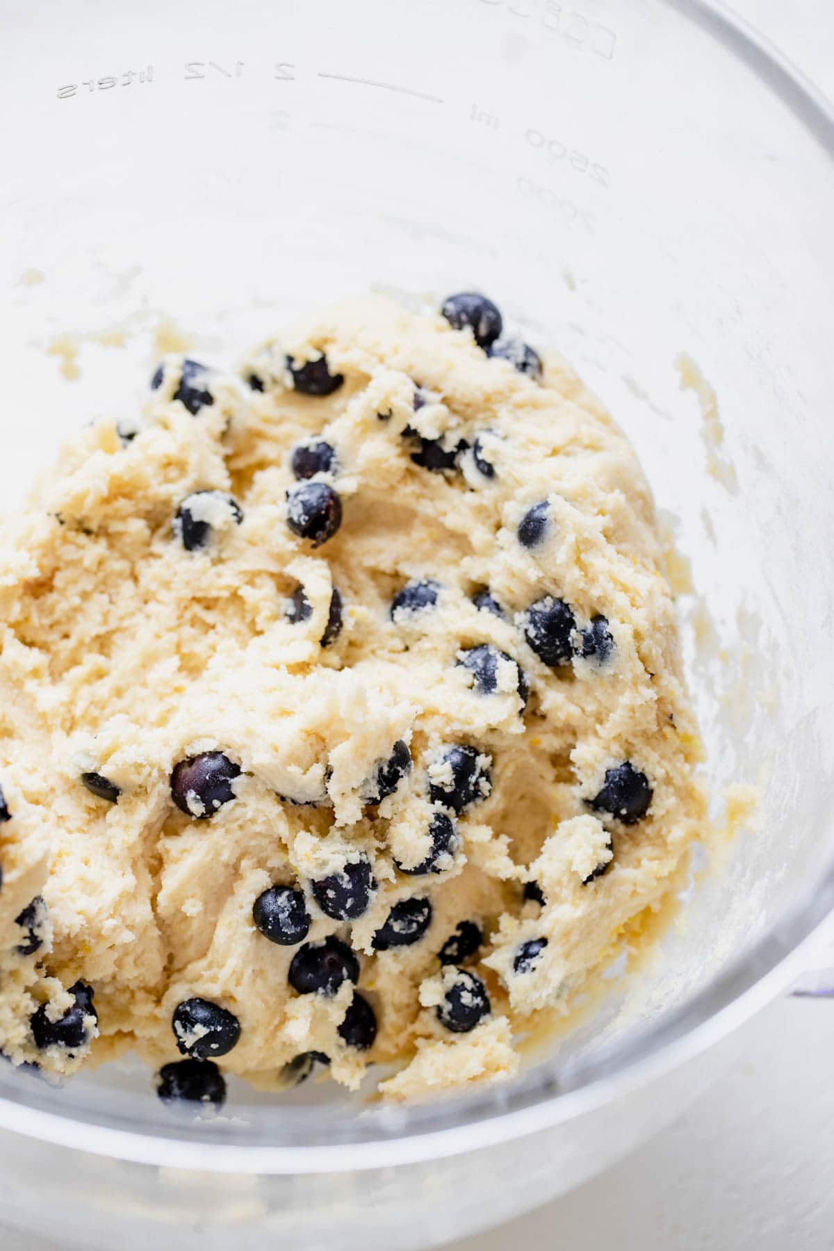 lemon blueberry cookie dough in a mixing bowl