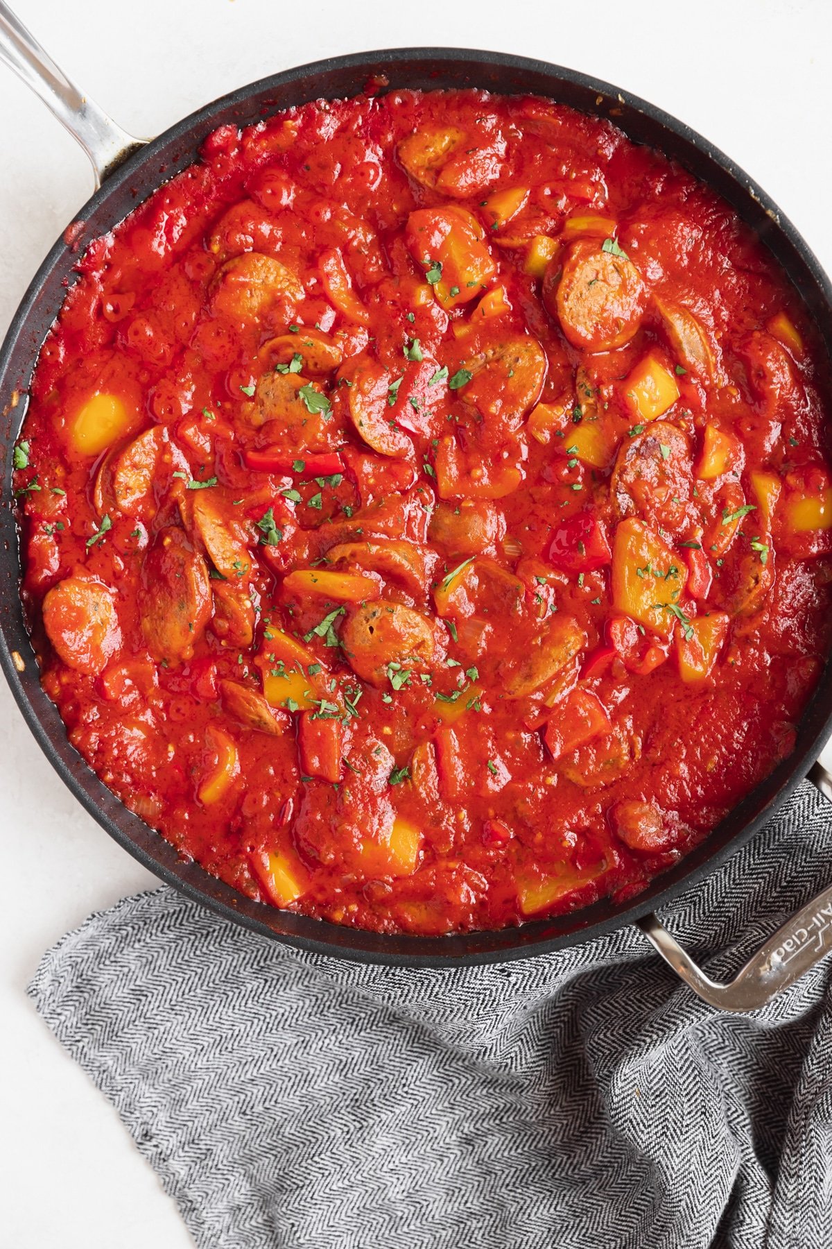 sausage and red sauce in a large skillet