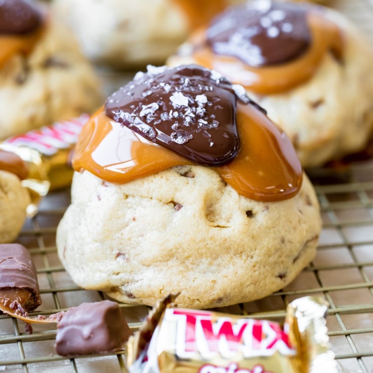 cookies topped with chocolate, caramel and sea salt