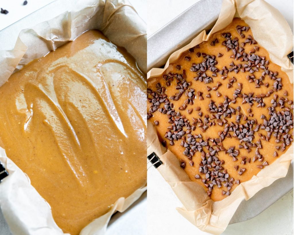peanut butter pumpkin chocolate chip fudge spread in an 8x8 inch pan lined with parchment paper and topped with chocolate chips