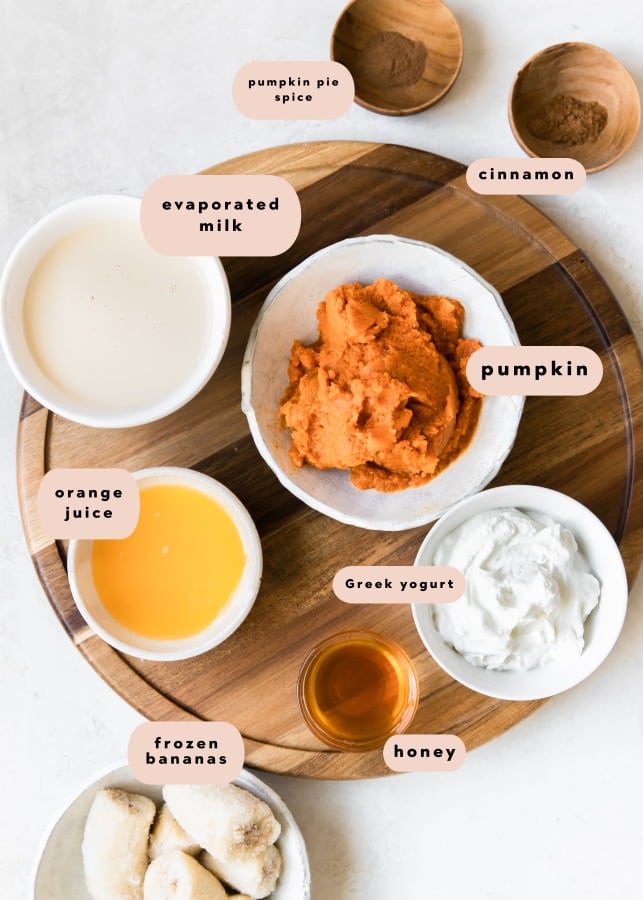 ingredients portioned out into small bowls on a wooden board