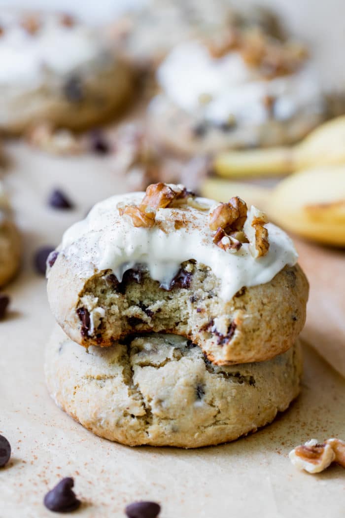 cookies stacked on top of each other with cream cheese frosting