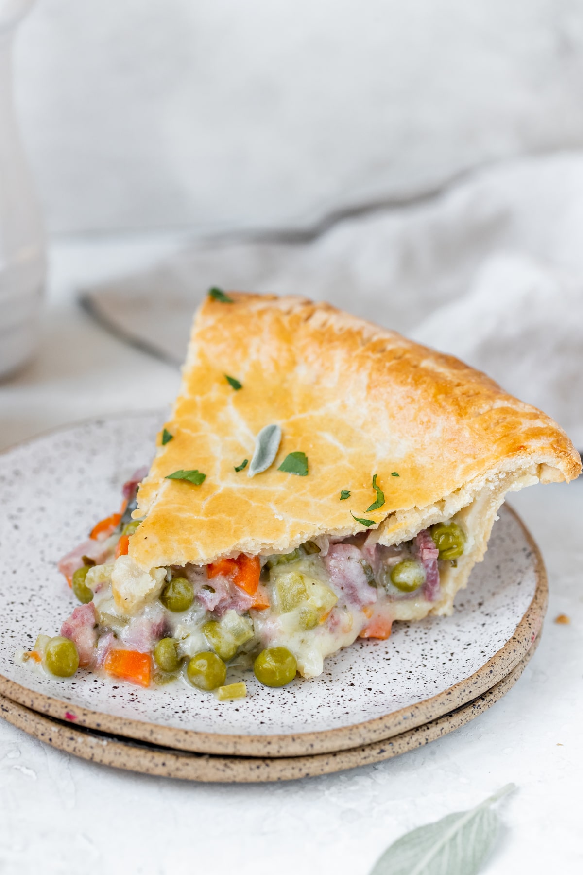 a slice of pot pie on a plate