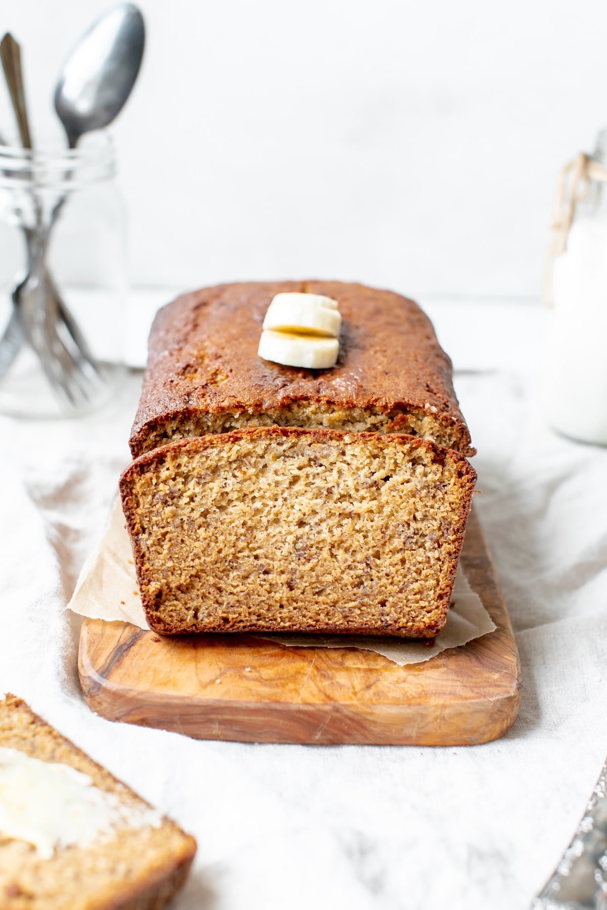 freshly baked banana bread on a cutting board