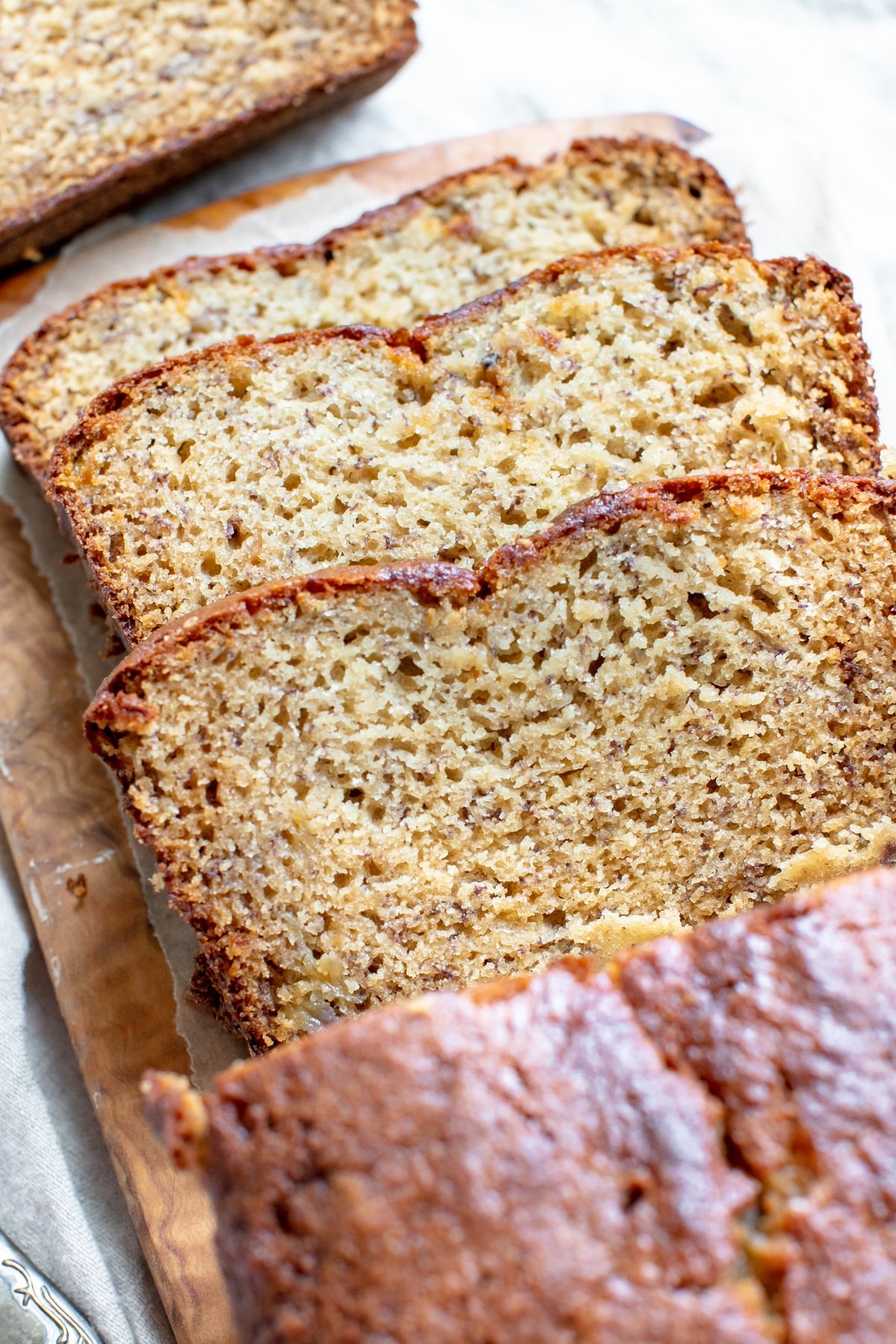 sliced banana bread on a cutting board