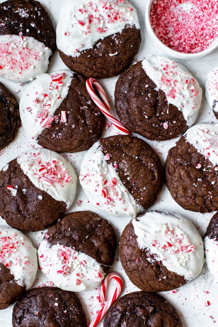 cookies dipped in white chocolate garnished with crushed peppermint candy canes