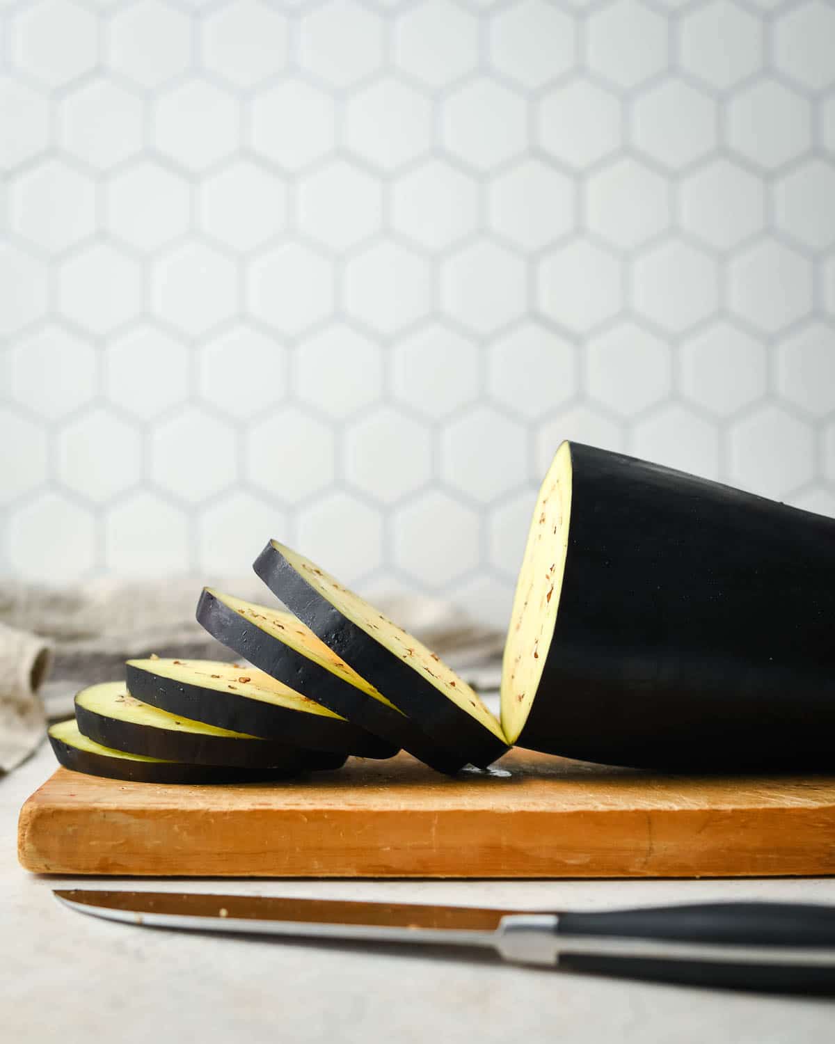 sliced eggplant on a cutting board