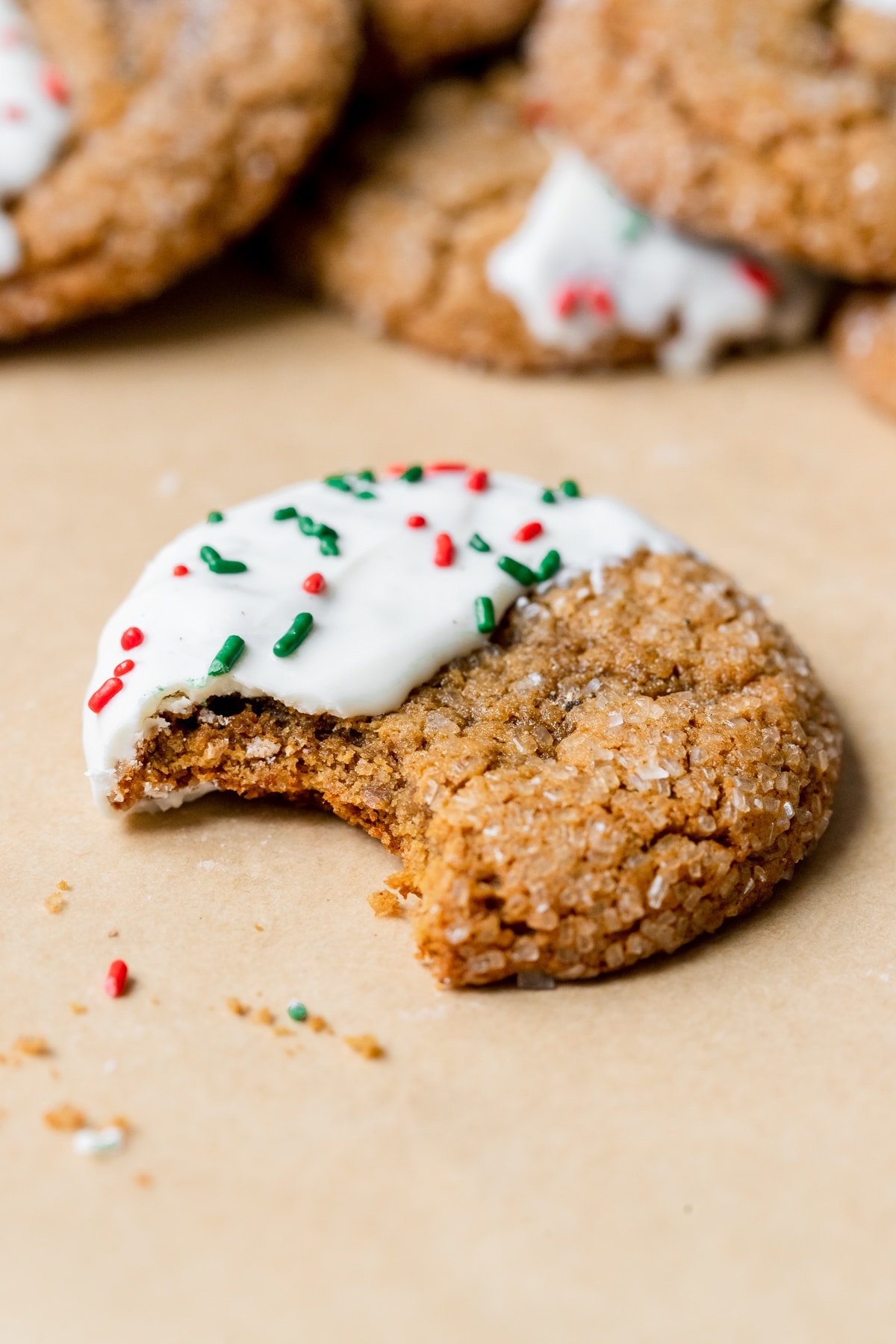 a molasses cookie dipped in white chocolate