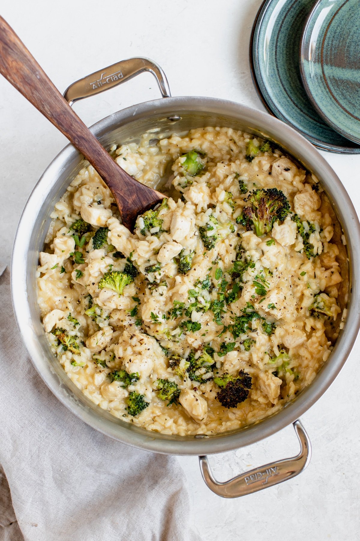 chicken broccoli risotto in a large all clad skillet