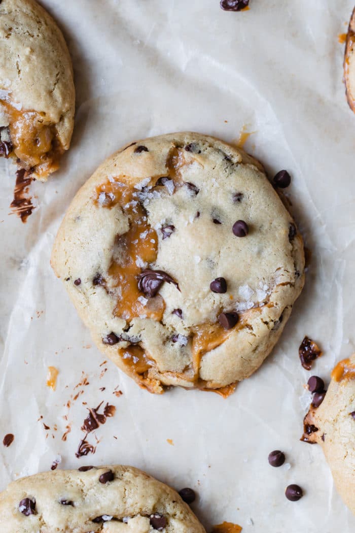 cookies made with caramel and chocolate chips on parchment paper