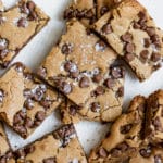 blondies cut into bars with salt on top and chocolate chips