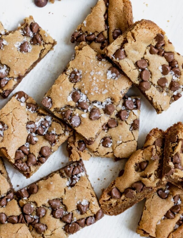 blondies cut into bars with salt on top and chocolate chips