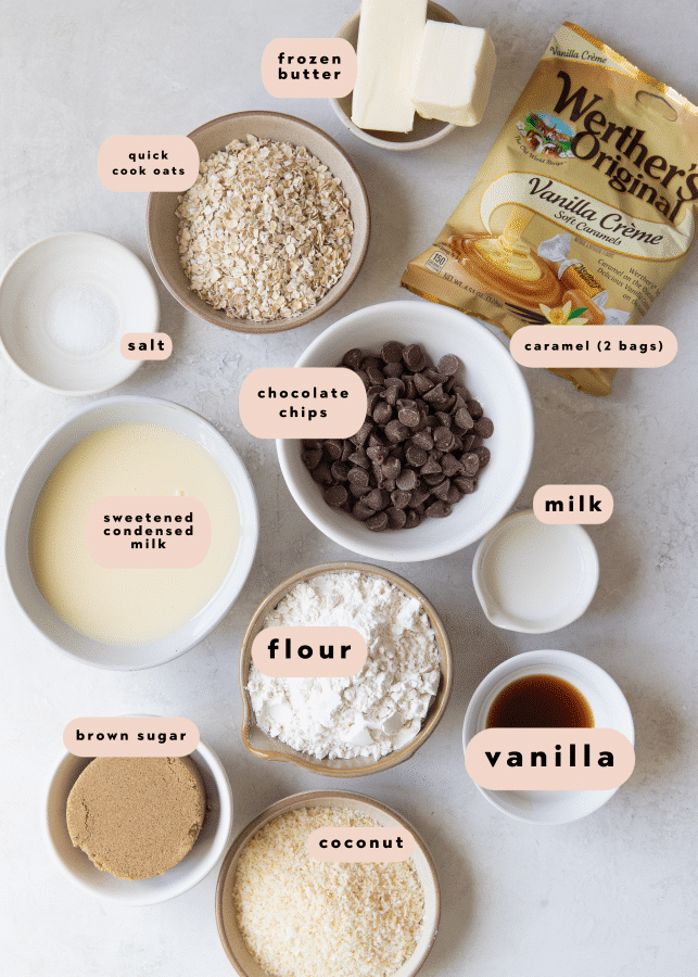 ingredients to make caramel bars in small white bowls
