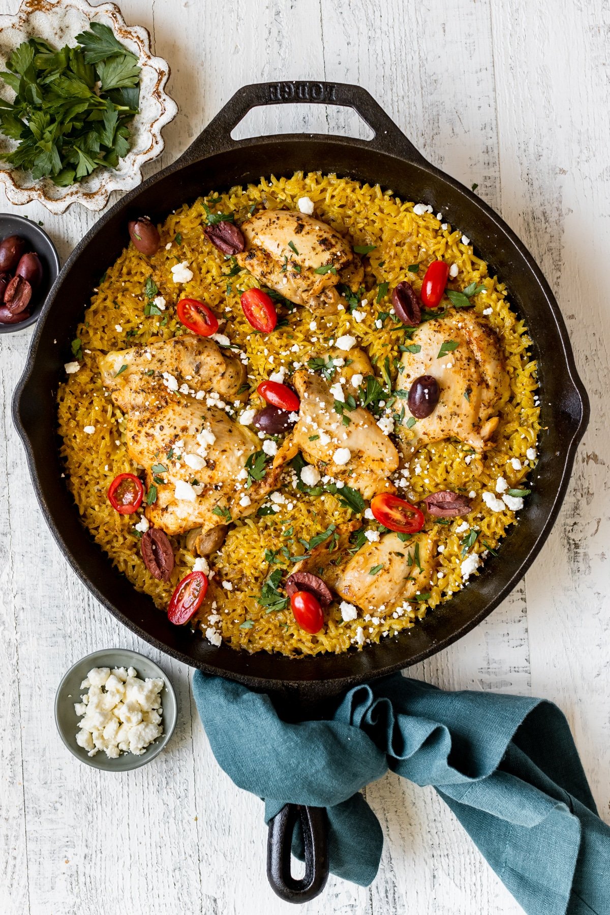 chicken and rice in a black cast iron skillet 