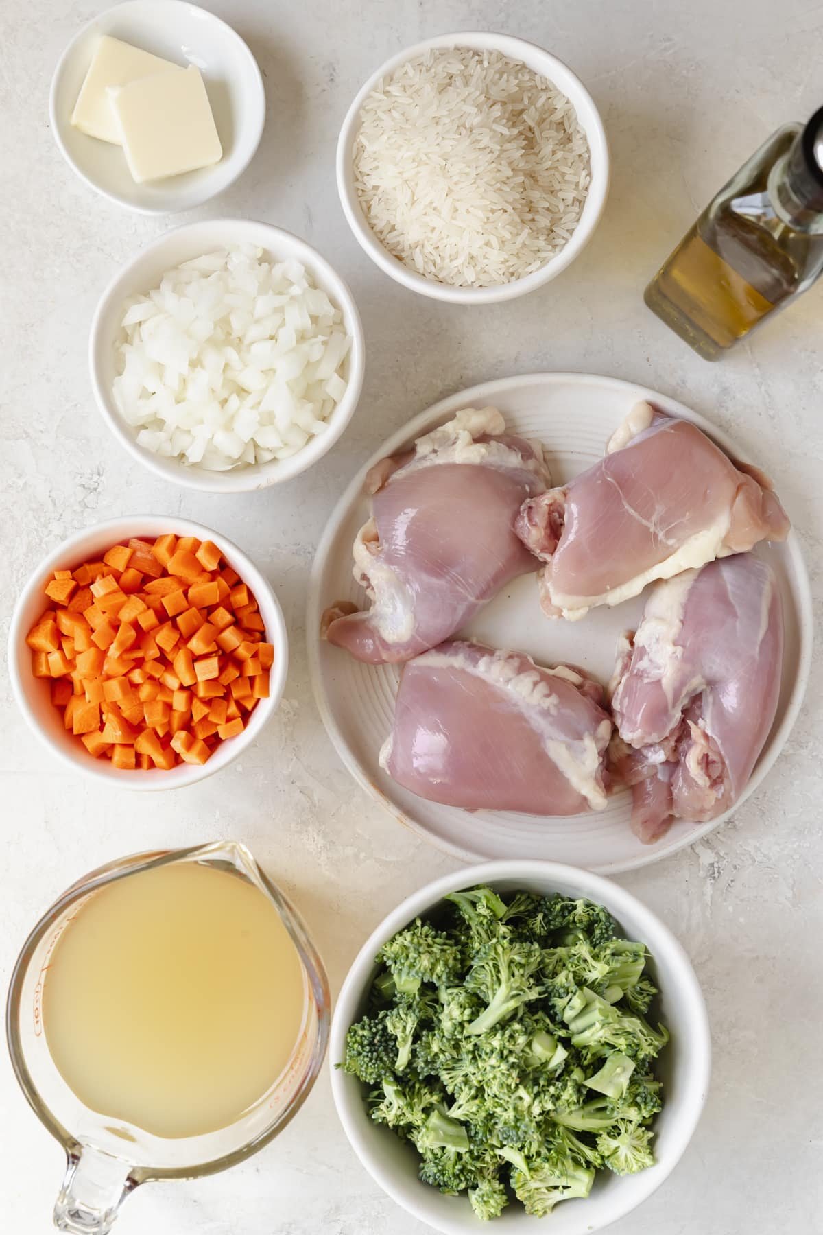 ingredients in small white bowls to make chicken teriyaki dinner. 
