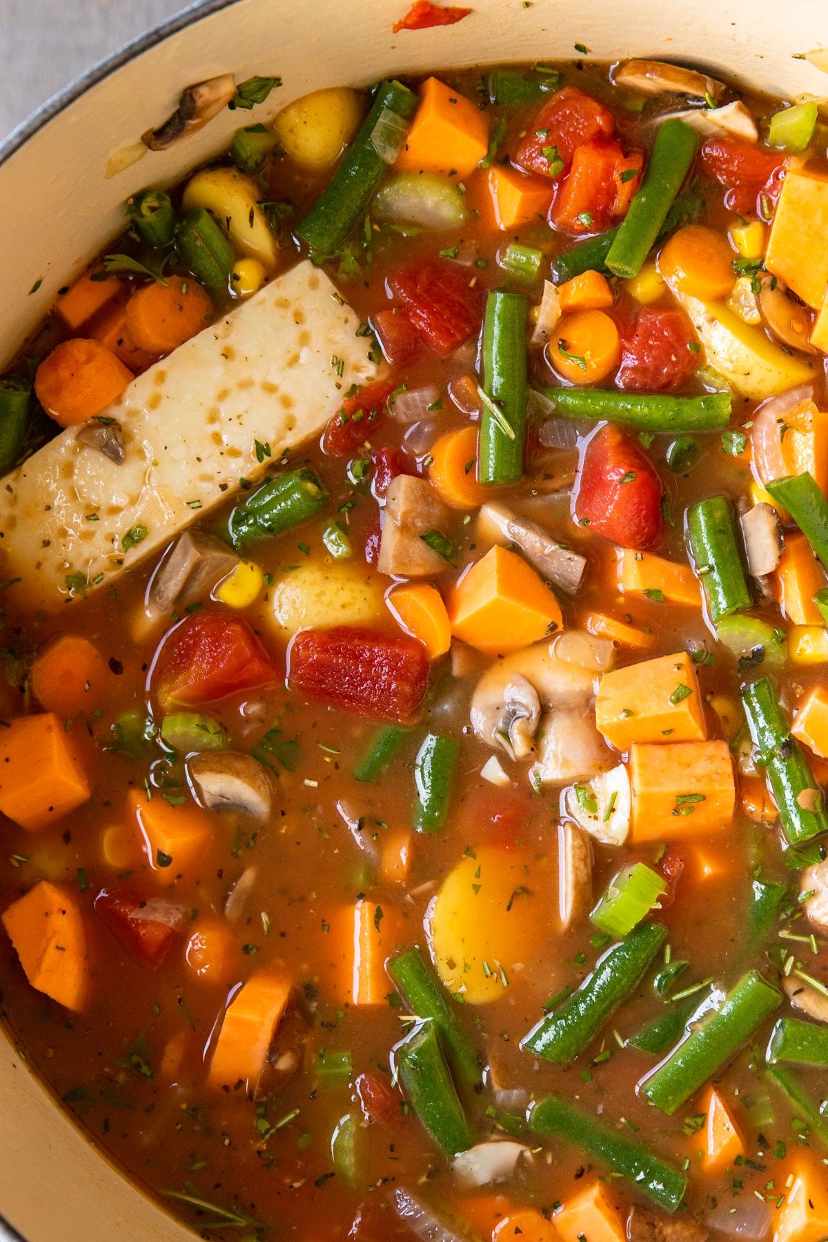 a close up image of vegetable soup. 