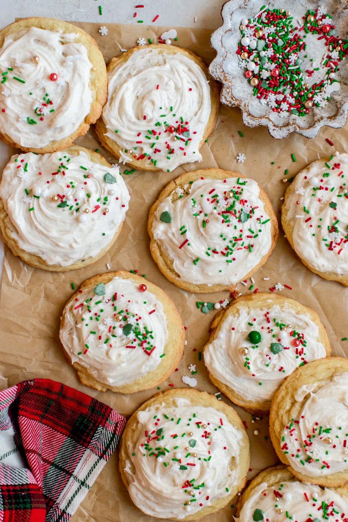 cookies with frosting and sprinkles on top. 