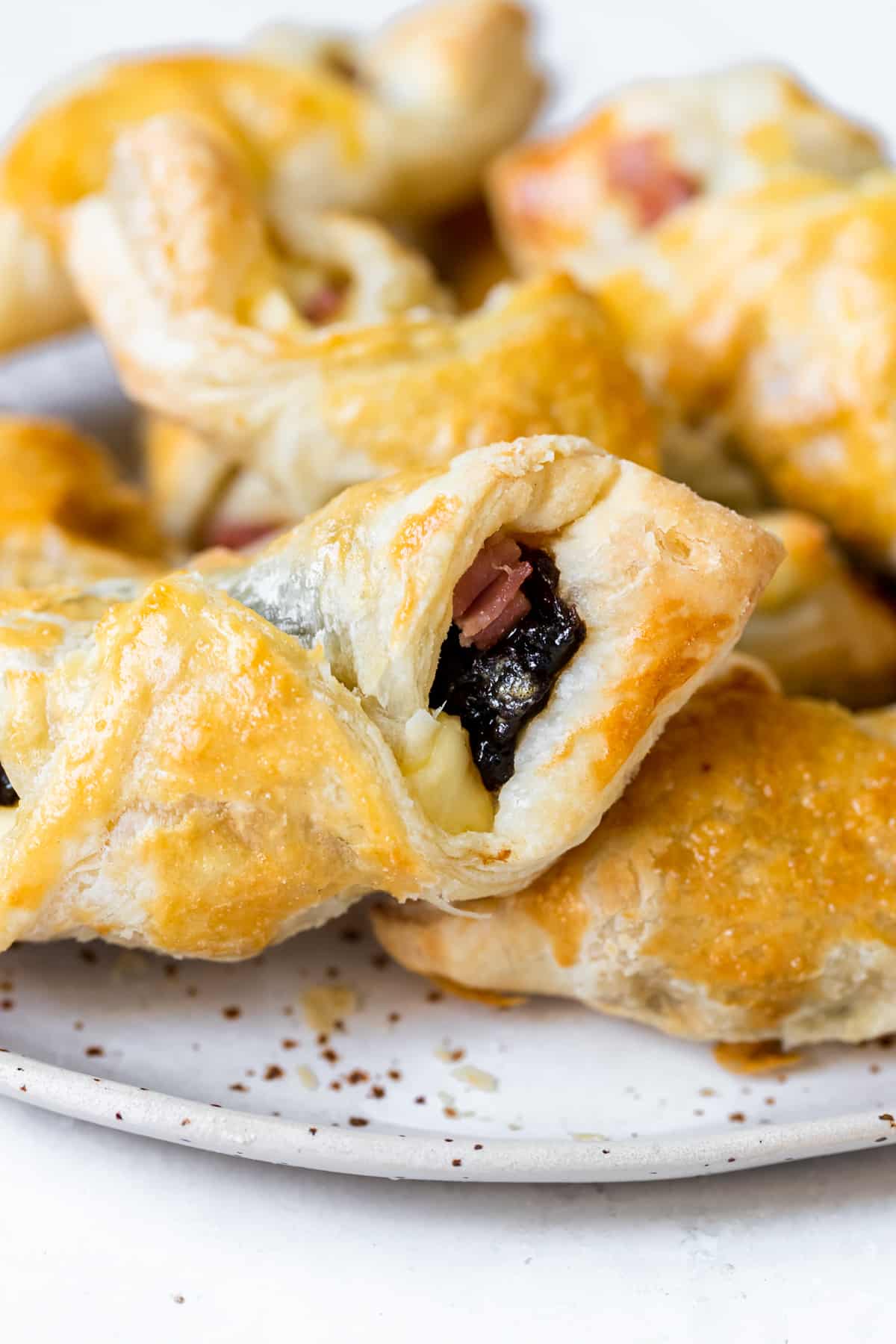 puff pastry filled with prunes, ham and cheese. 