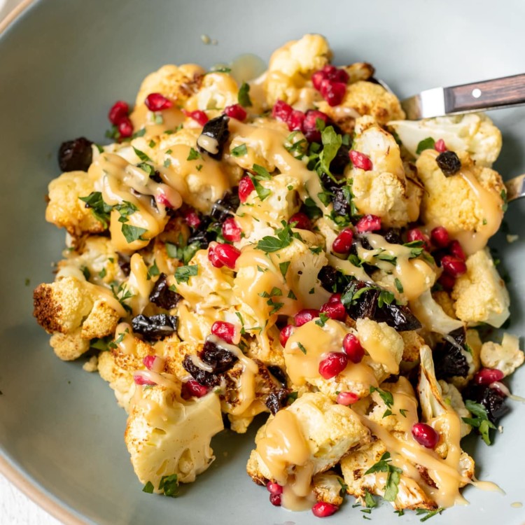 cauliflower drizzled in a mustard sauce with pomegranate perils & green spices