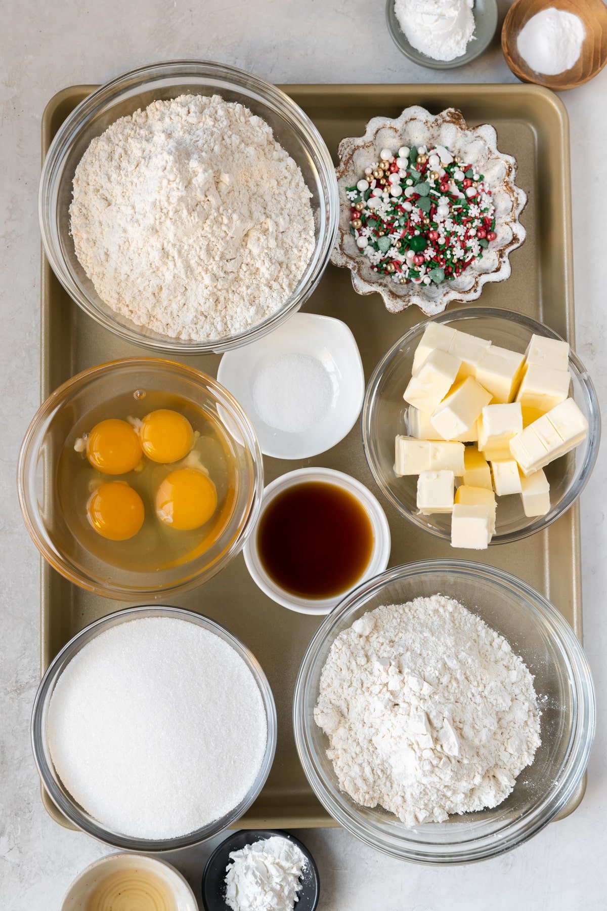 ingredients for cookies in glass bowls. 