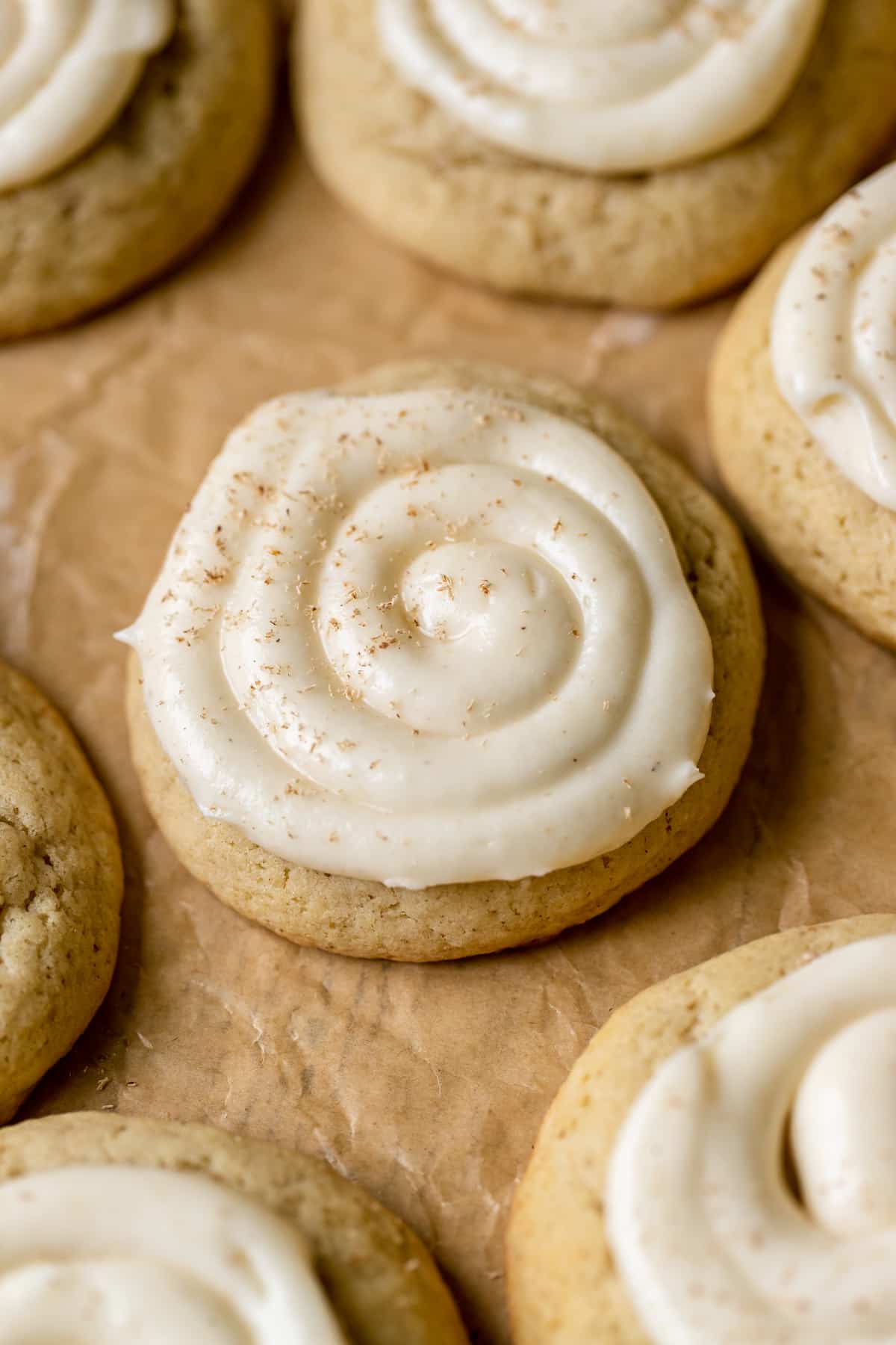 a cookie with cream cheese frosting on top. 