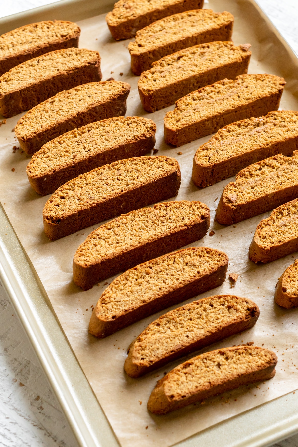 biscotti on a baking sheet lined with parchment paper. 