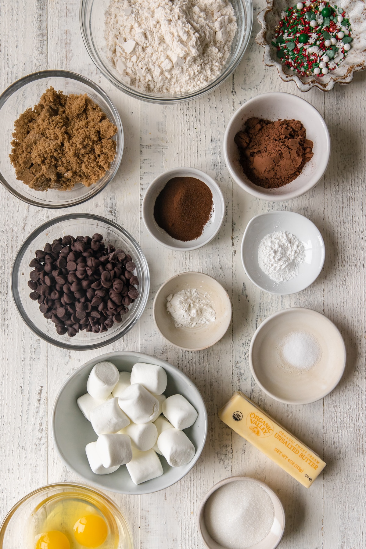 ingredients in small glass bowls to make cookies. 