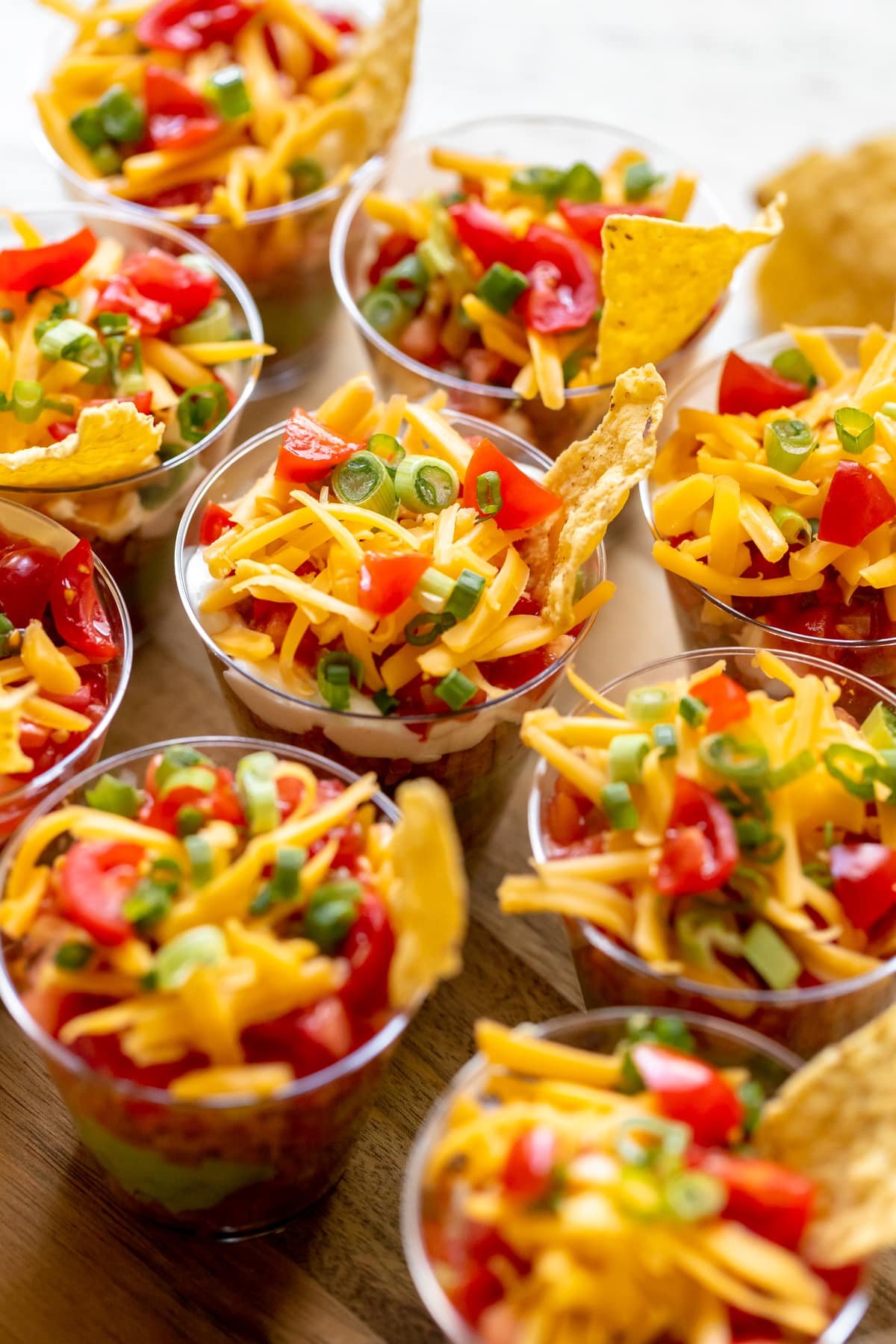 bean dip in individual cups with chips.