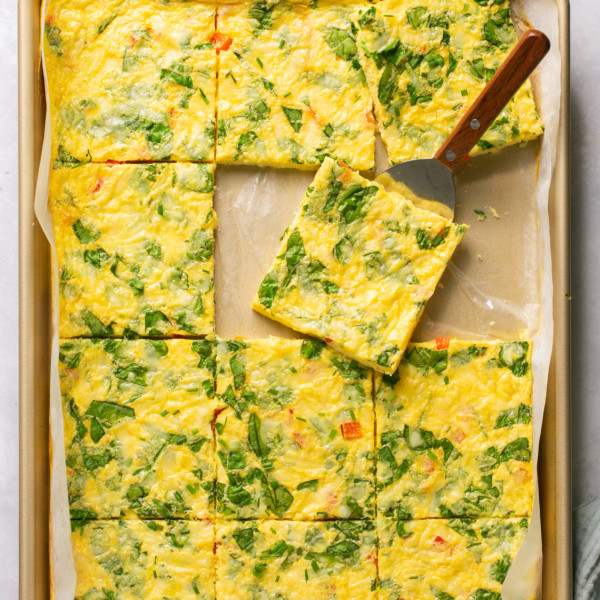 sheet pan with cooked eggs sliced into squares