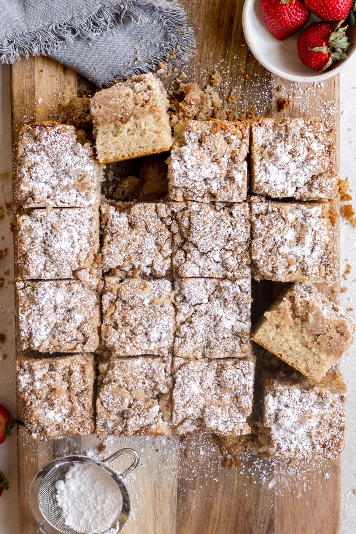 crumb cake with powdered sugar on top. 