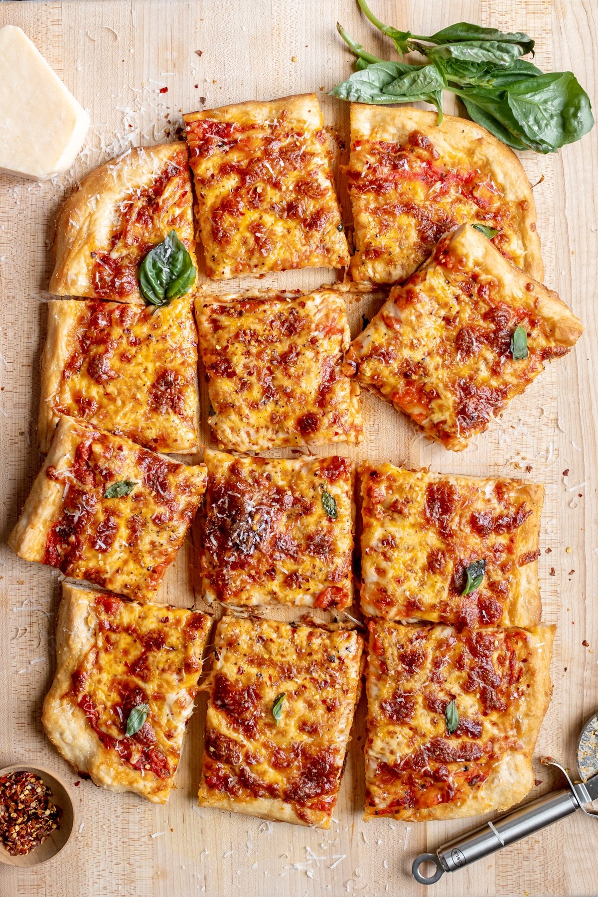 rectangle cheese pizza cut into squares