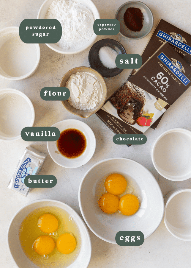 ingredients needed to make molten cakes in small white glass bowls. 