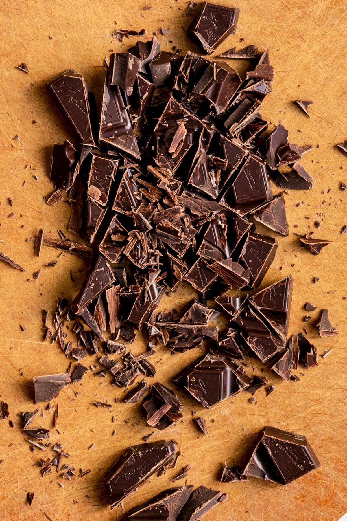 chopped bittersweet chocolate on a cutting board. 