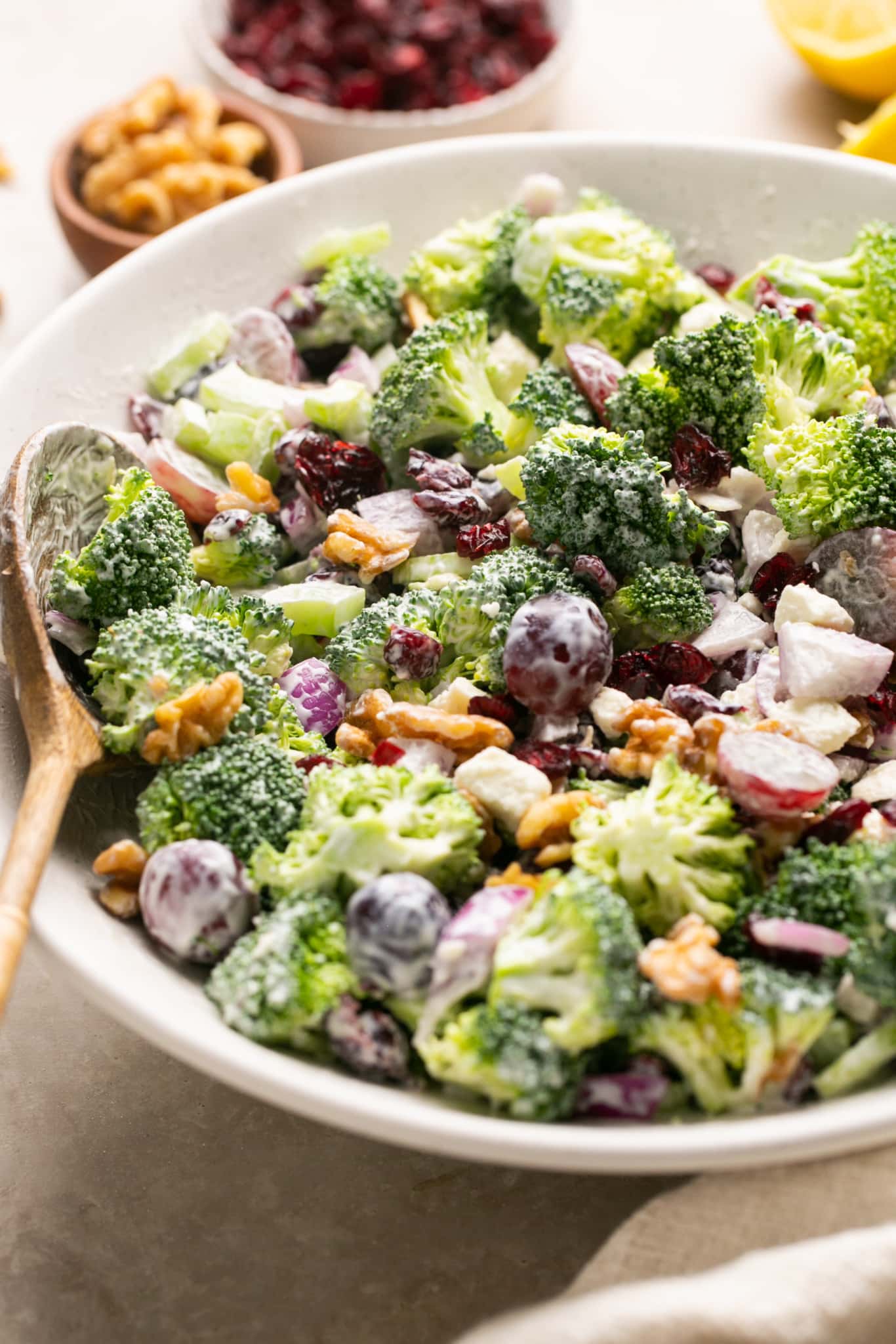broccoli salad in a white bowl.