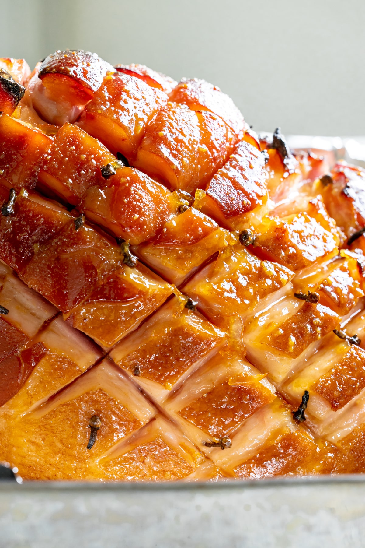 an up close image of a glazed ham. 