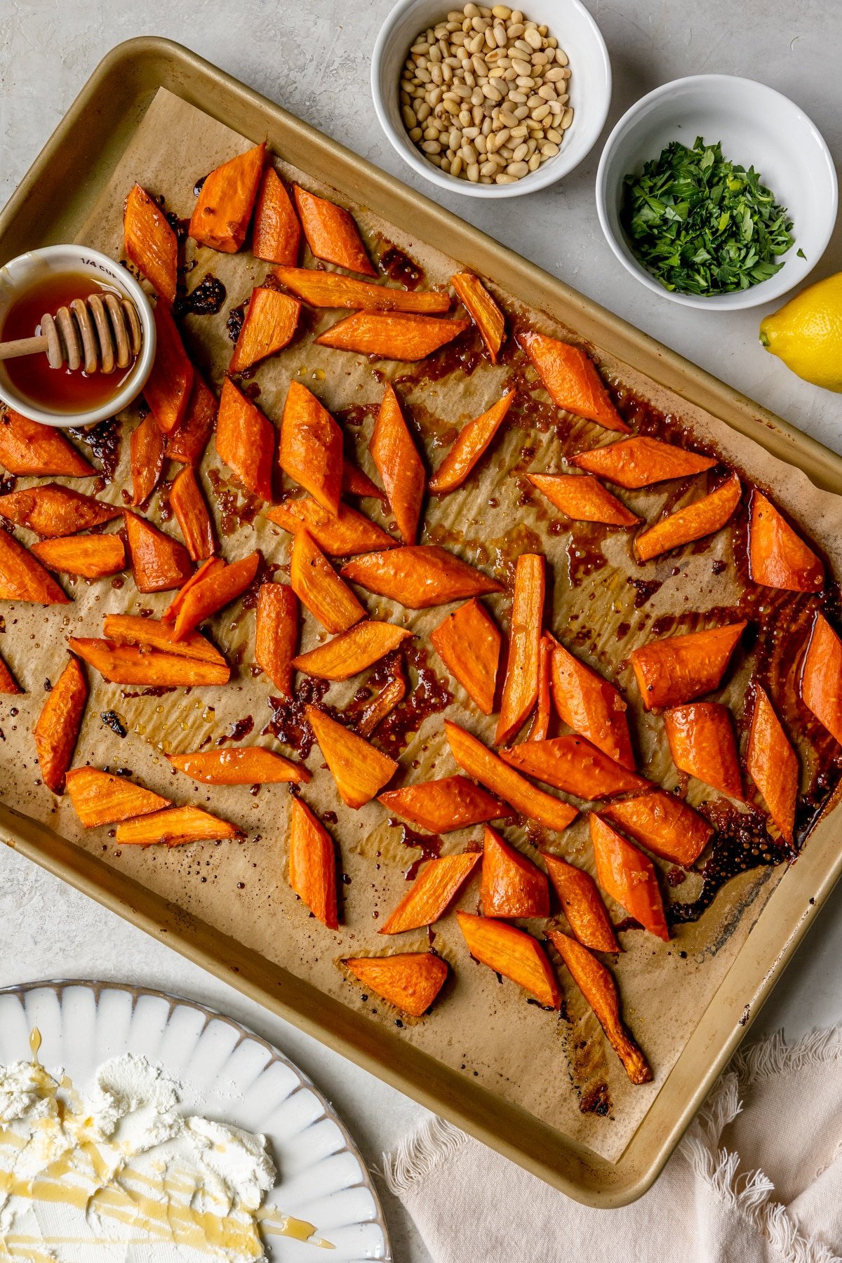 roasted carrots on a sheet pan. 
