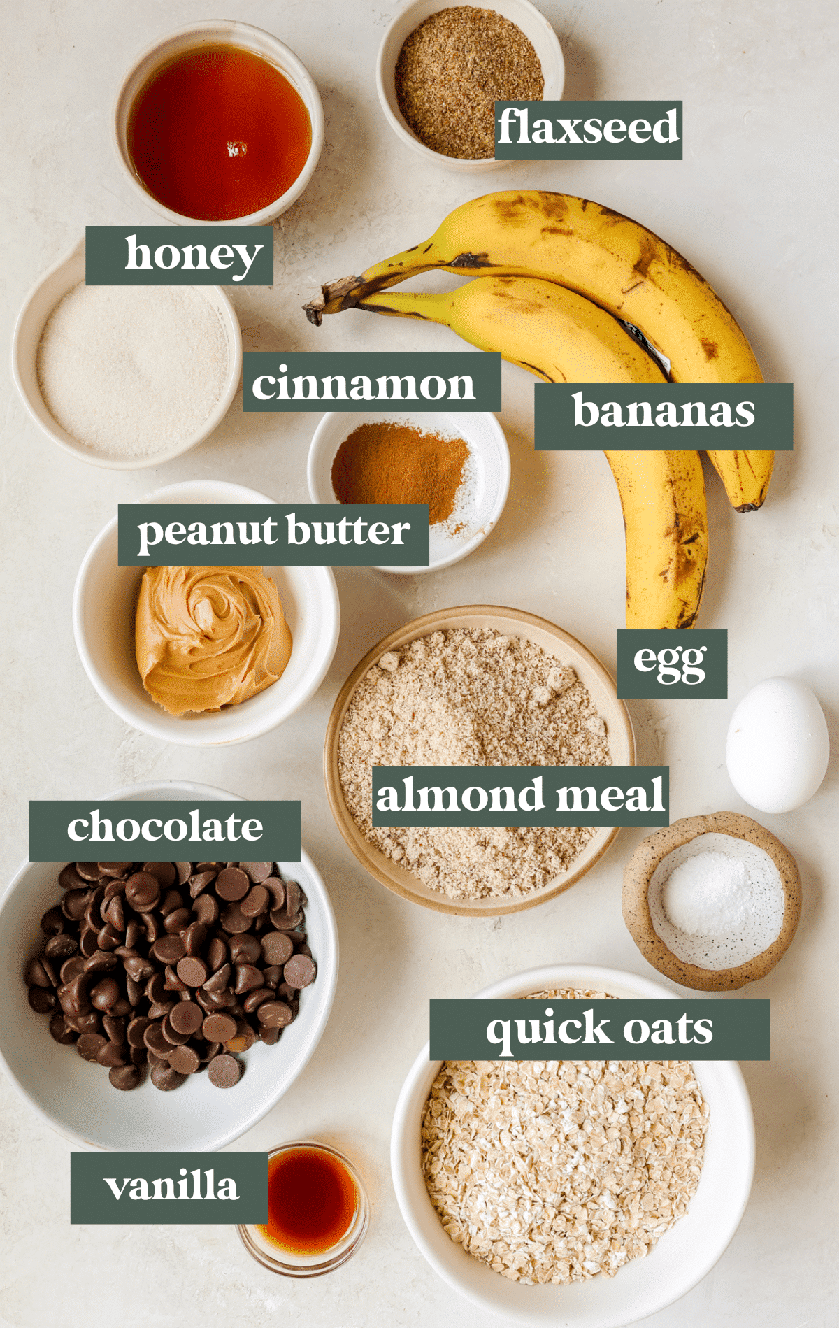 ingredients needed to make breakfast bars in small glass bowls. 