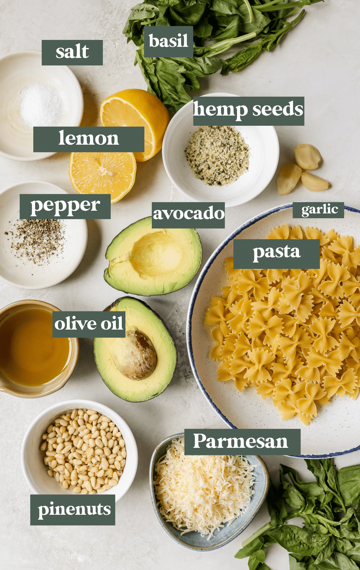ingredients to make pesto in small bowls. 