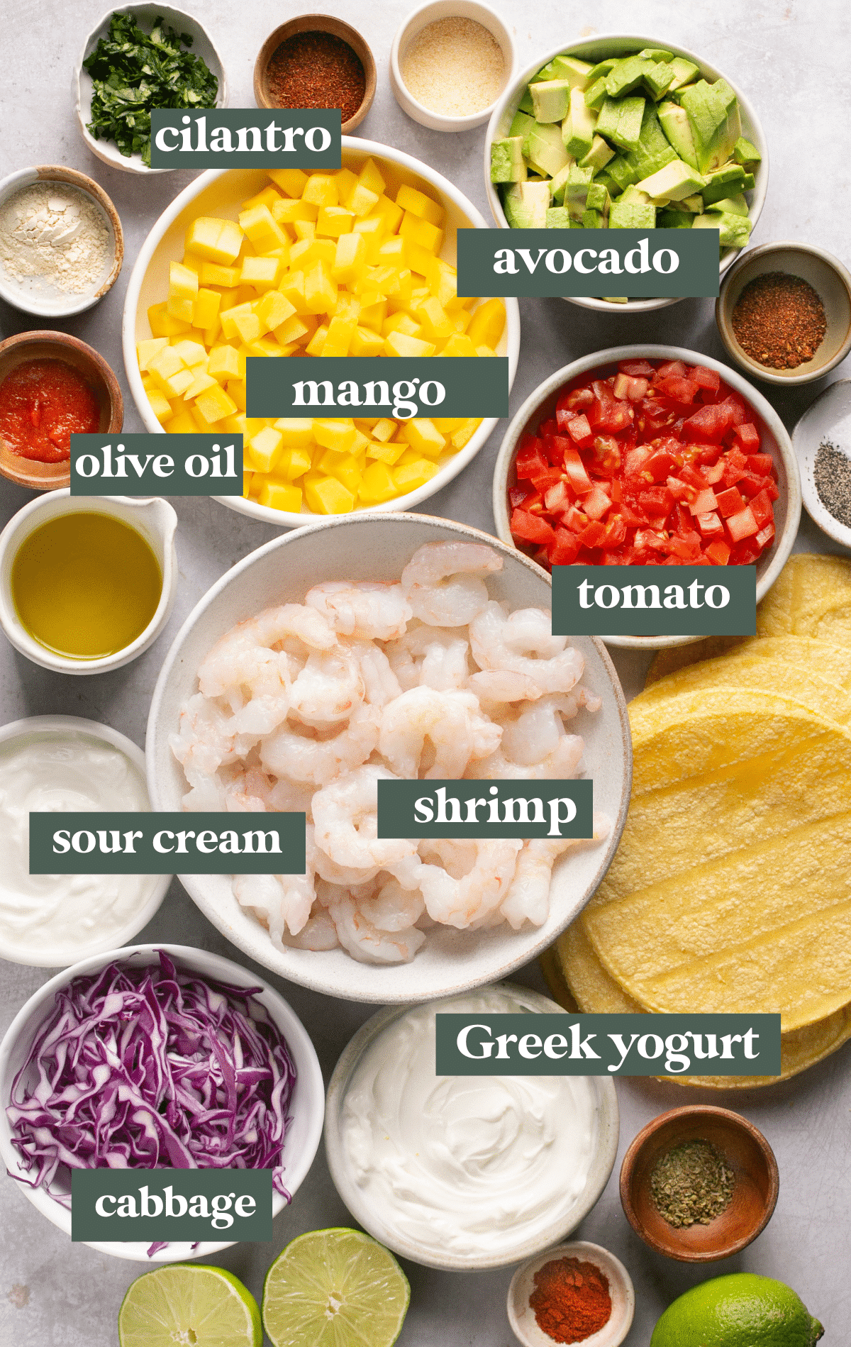 ingredients to make tacos in small white bowls. 